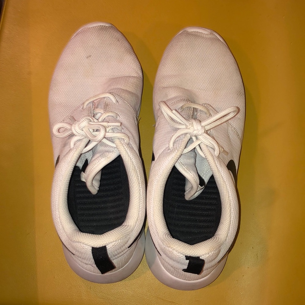 Nike tennis shoes fits like a 9